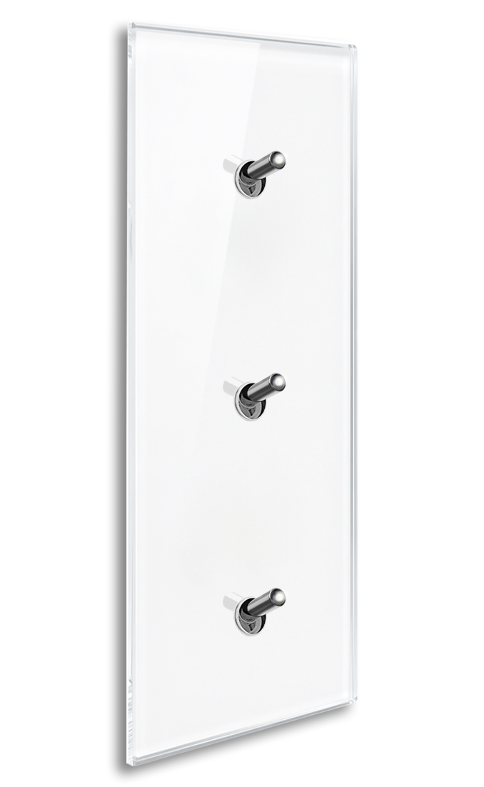 Modern illuminated design light switch in white glass optic with 3 chrome toggle levers. YORK